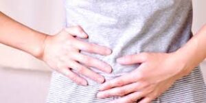 a person holding their stomach